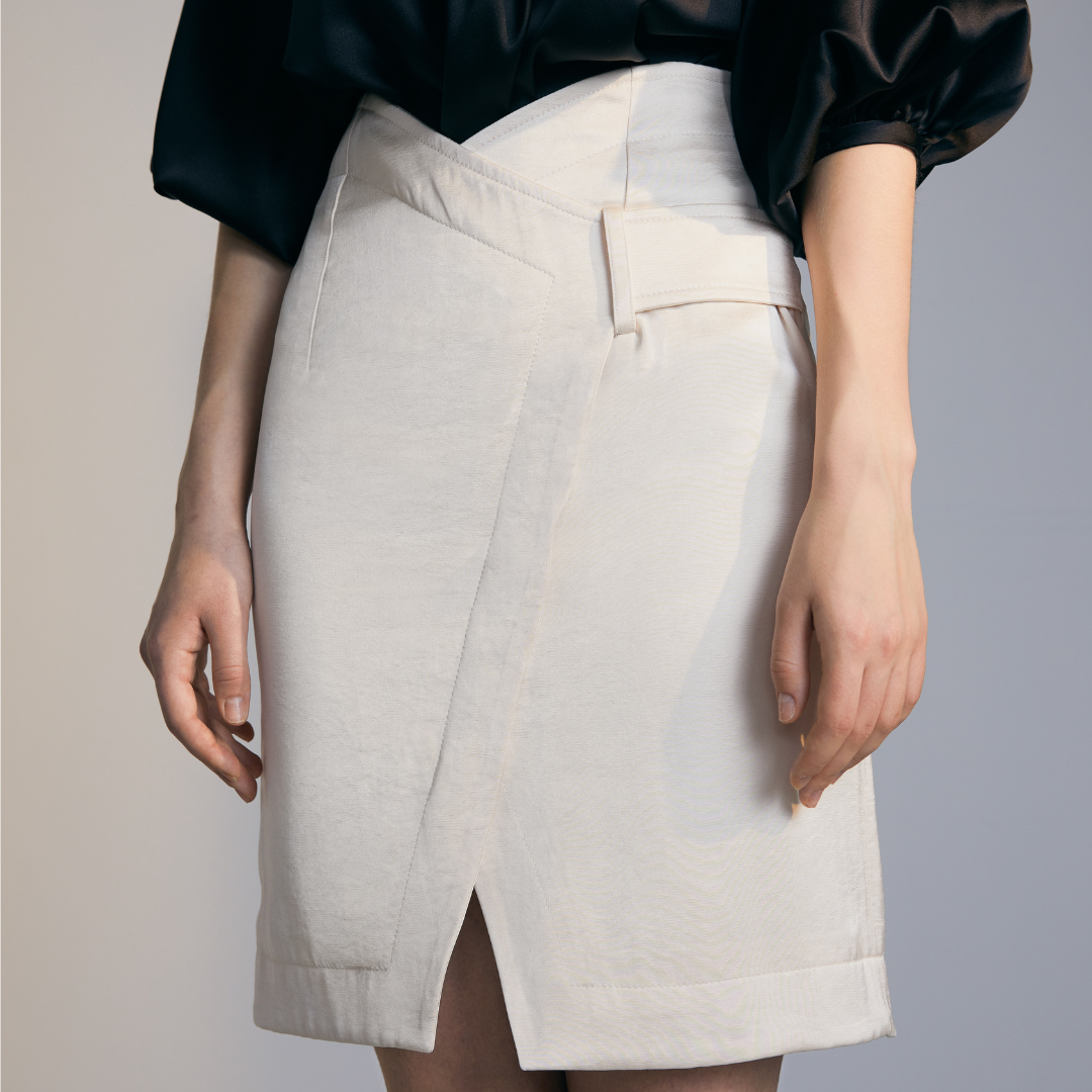 Close-up of the front of a model wearing a white Short Skirt