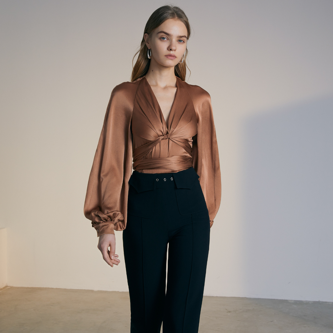 The front of a model wearing a brown colored Knotted Silk Shirt
