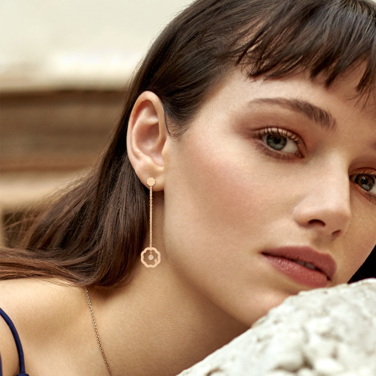 Close-up of a model wearing Bohemian MIMOSA rose gold Earrings