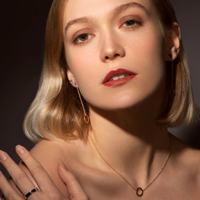 A model wearing a Minimalist MIMOSA rose gold Pendant necklace