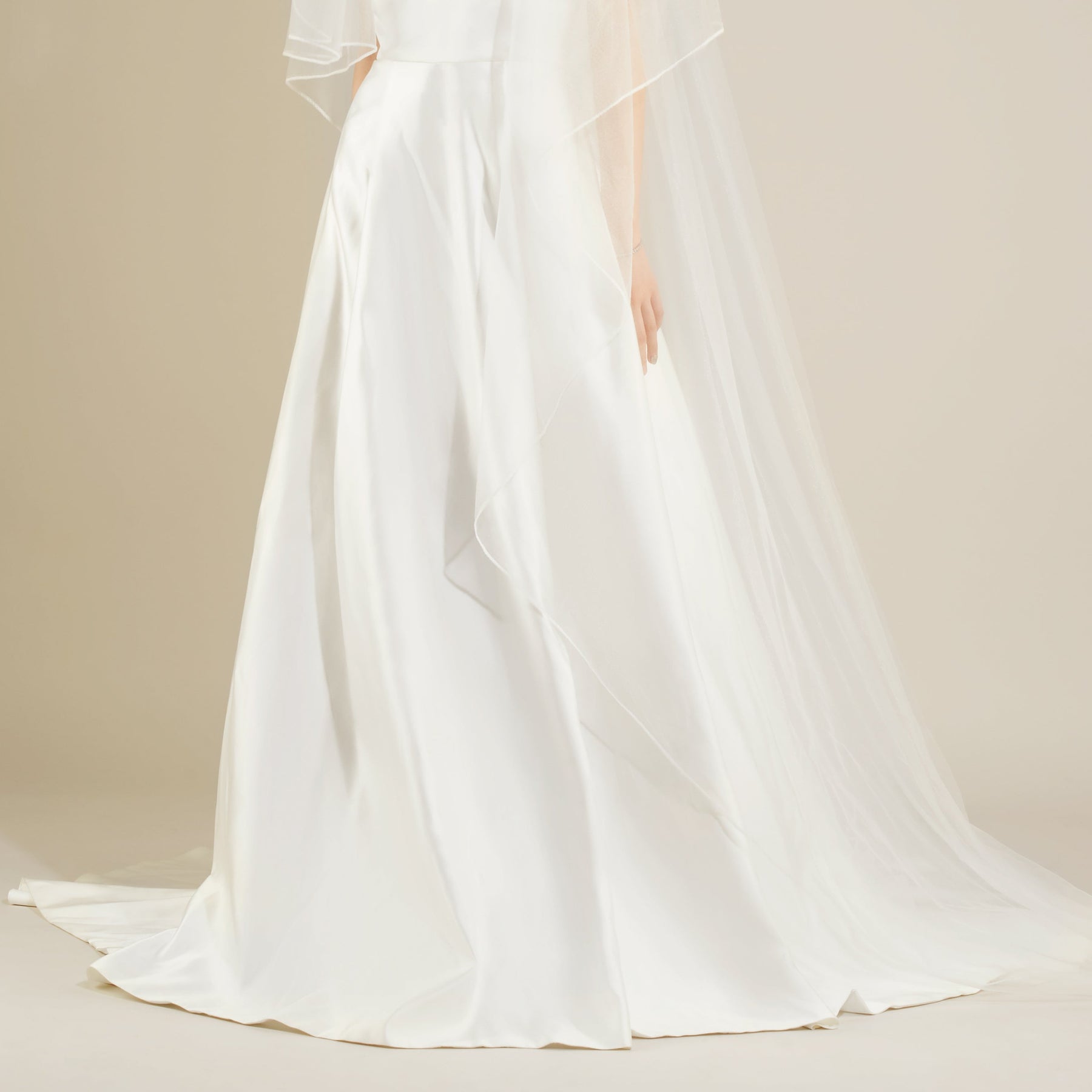 The front of a model wearing a white MARGUERITE Wedding Dress